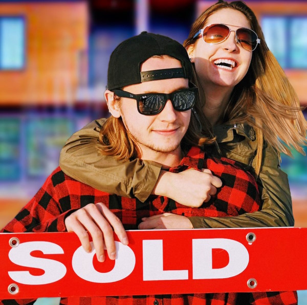Photo of man and woman buying their first home